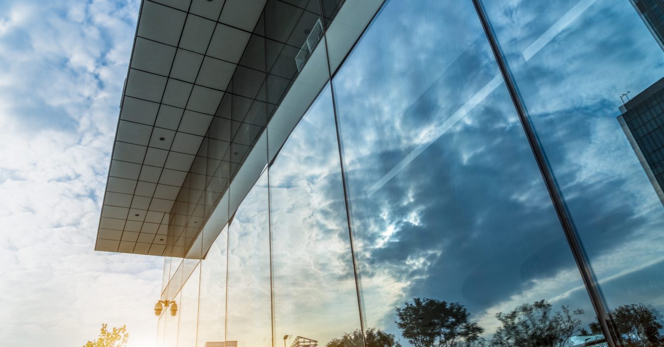 Reflection of architecture on modern office building Reflection of architecture on modern office building